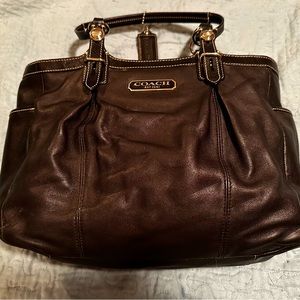 Authentic black leather Coach purse. Zipper closure. Handles. No rips or tears